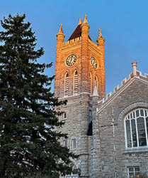 view of the historic stone church from front yard