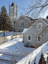 view of the historic stone church from the bedroom window